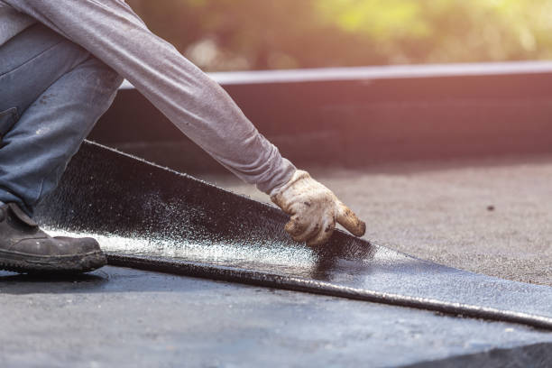 Professional Emergency Waterproofing technician working in Crozet, VA